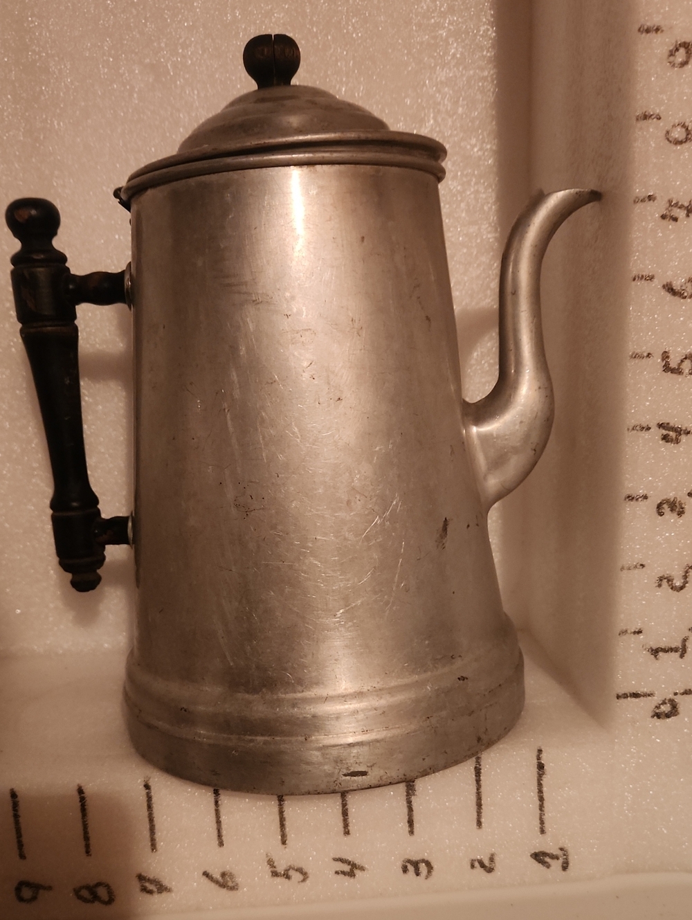 Vintage aluminum coffee maker. It was manufactured in the United States by the A
